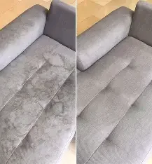 Clean living room with freshly cleaned carpet and fabric couch