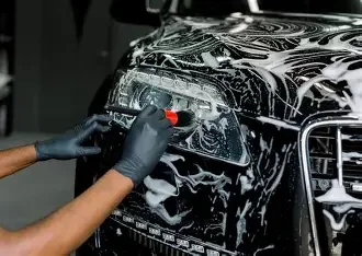 Professional car interior cleaning service in progress